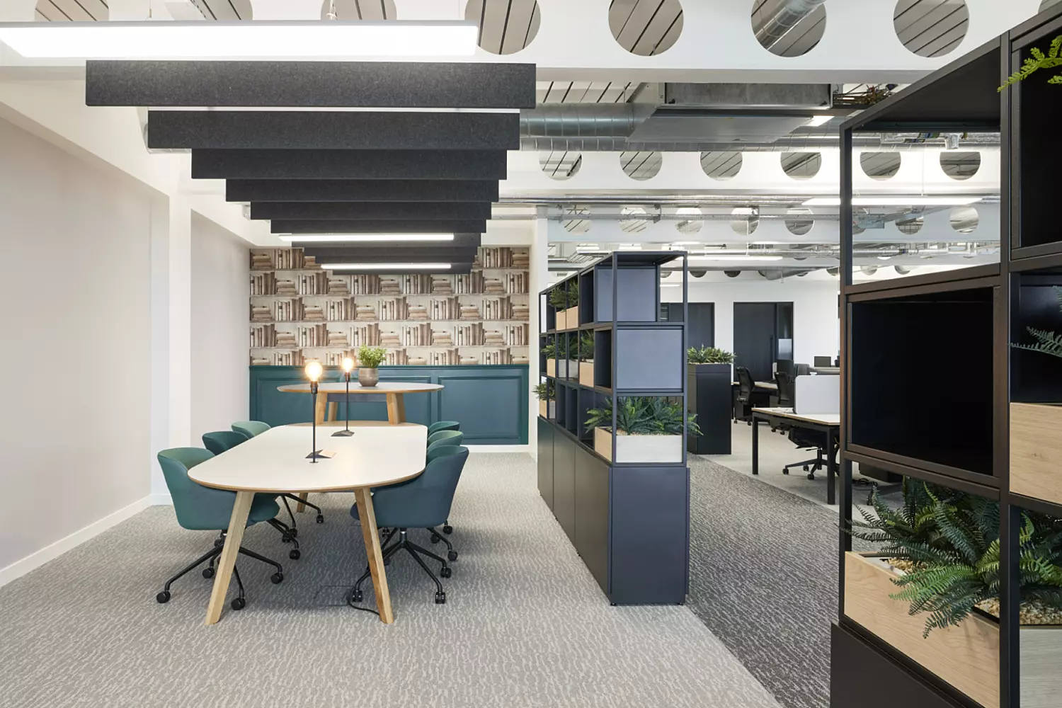 Planters divide traditional and collaborative office space