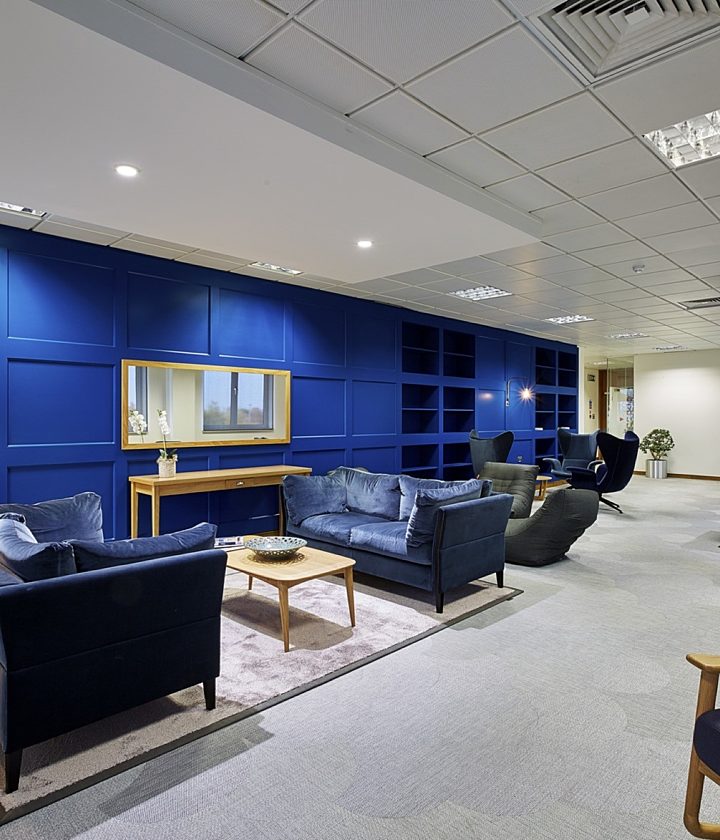 Blue panelled walls in reception fit out