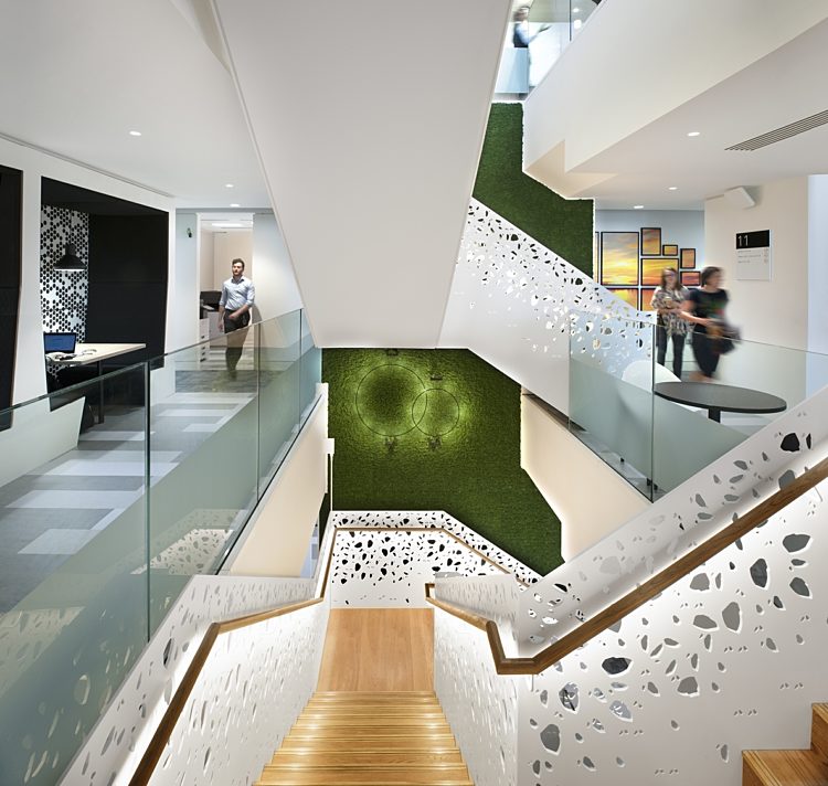 Deloitte staircase with biophilic moss wall